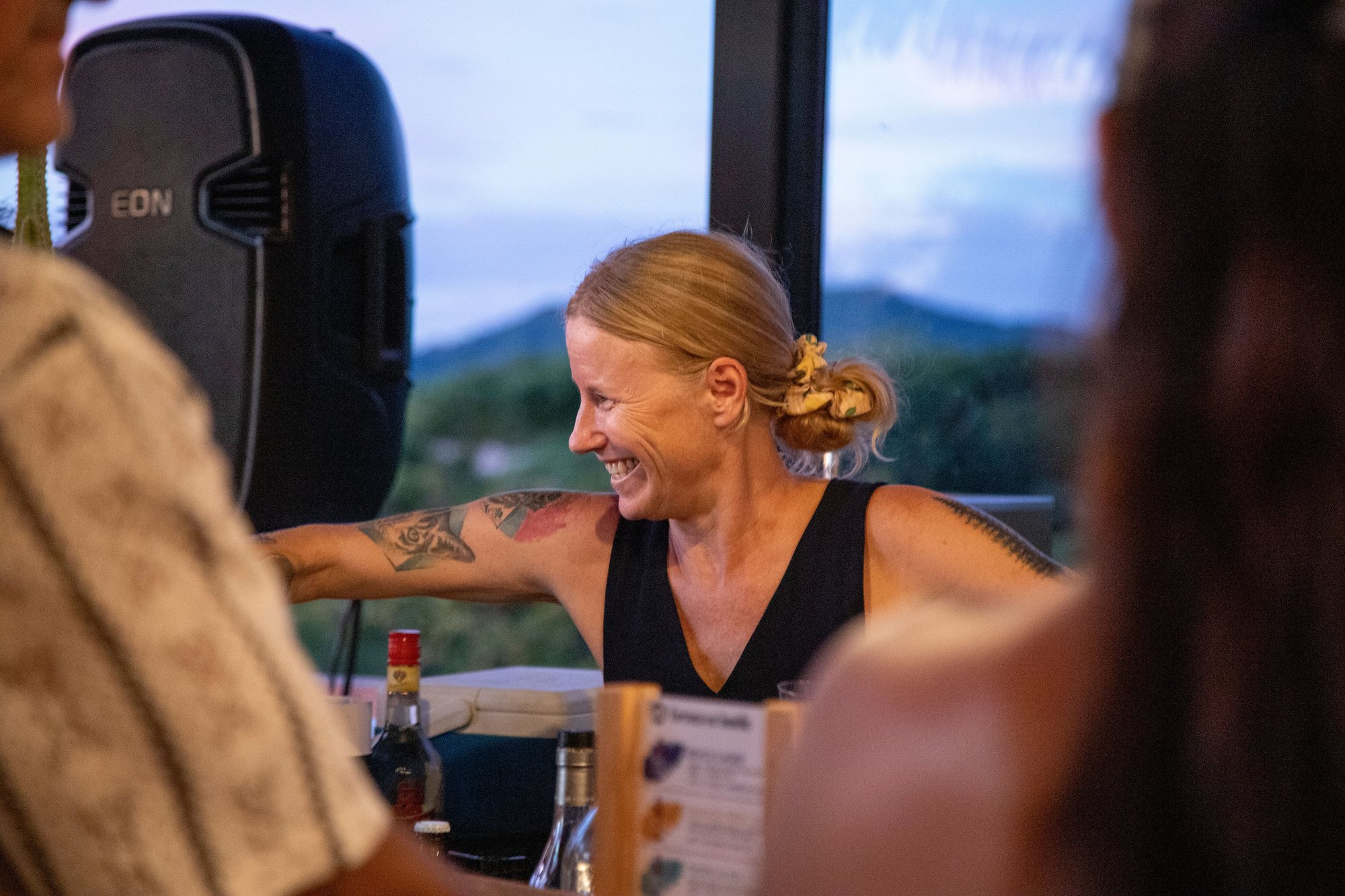 A guest laughing with a member of staff