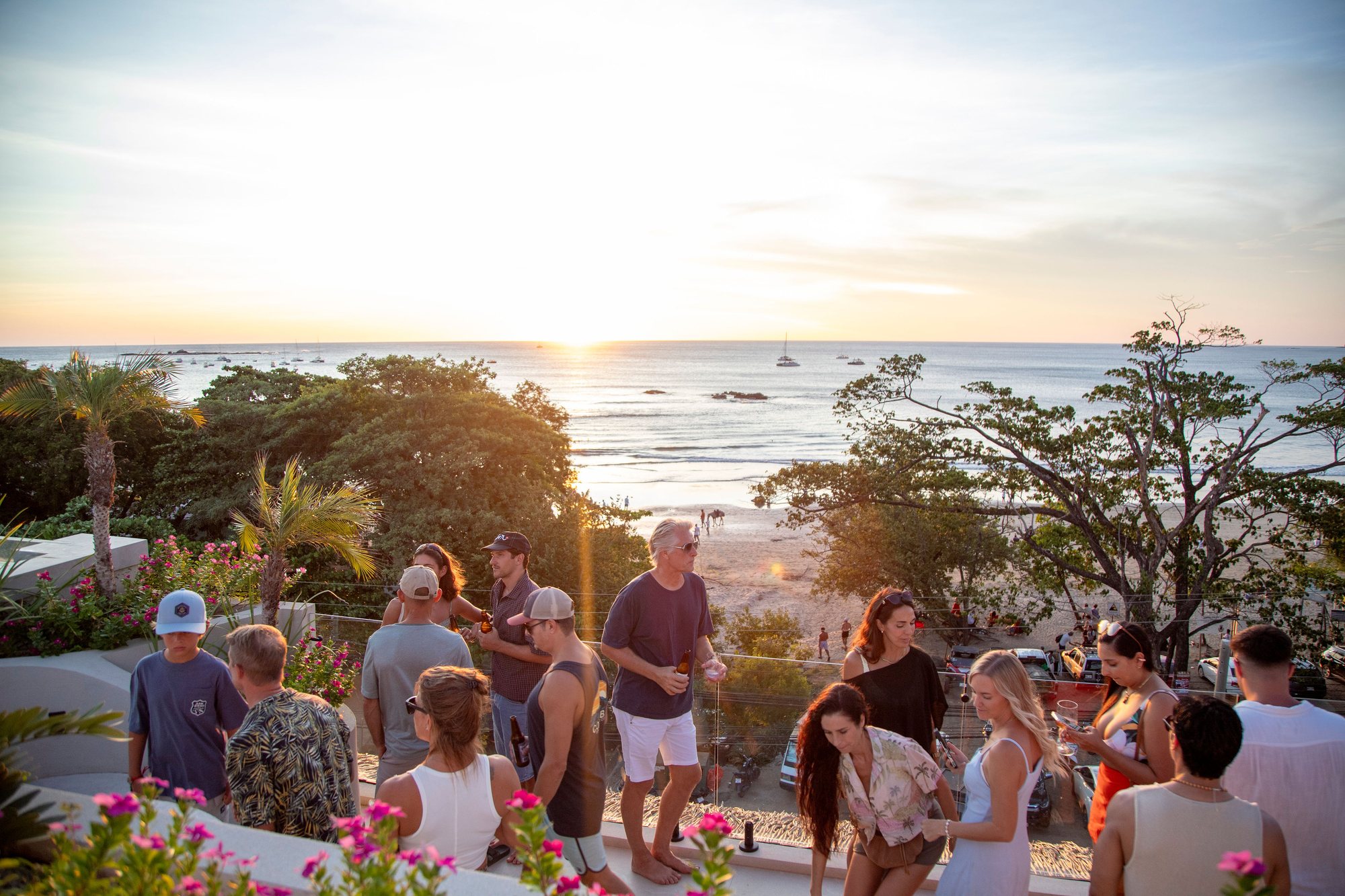 A gathering on the rooftop at golden hour