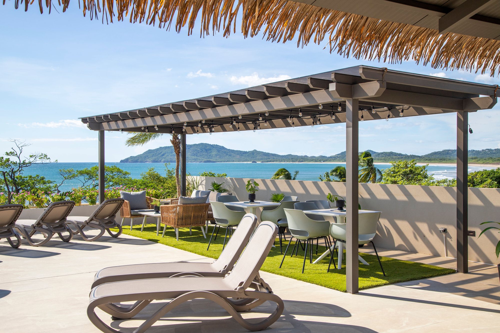 Naia's rooftop lounge and pergola overlooking Tamarindo