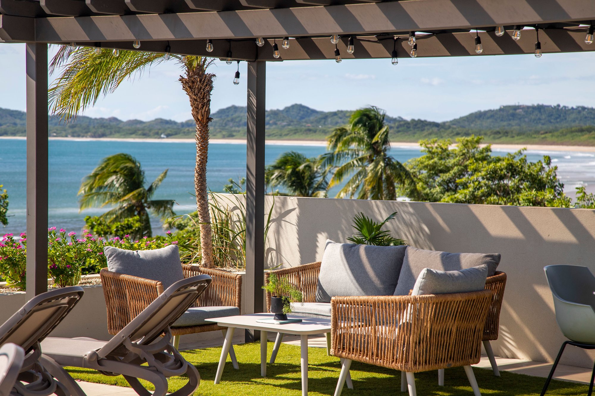 Pergola and lounge seating with ocean view