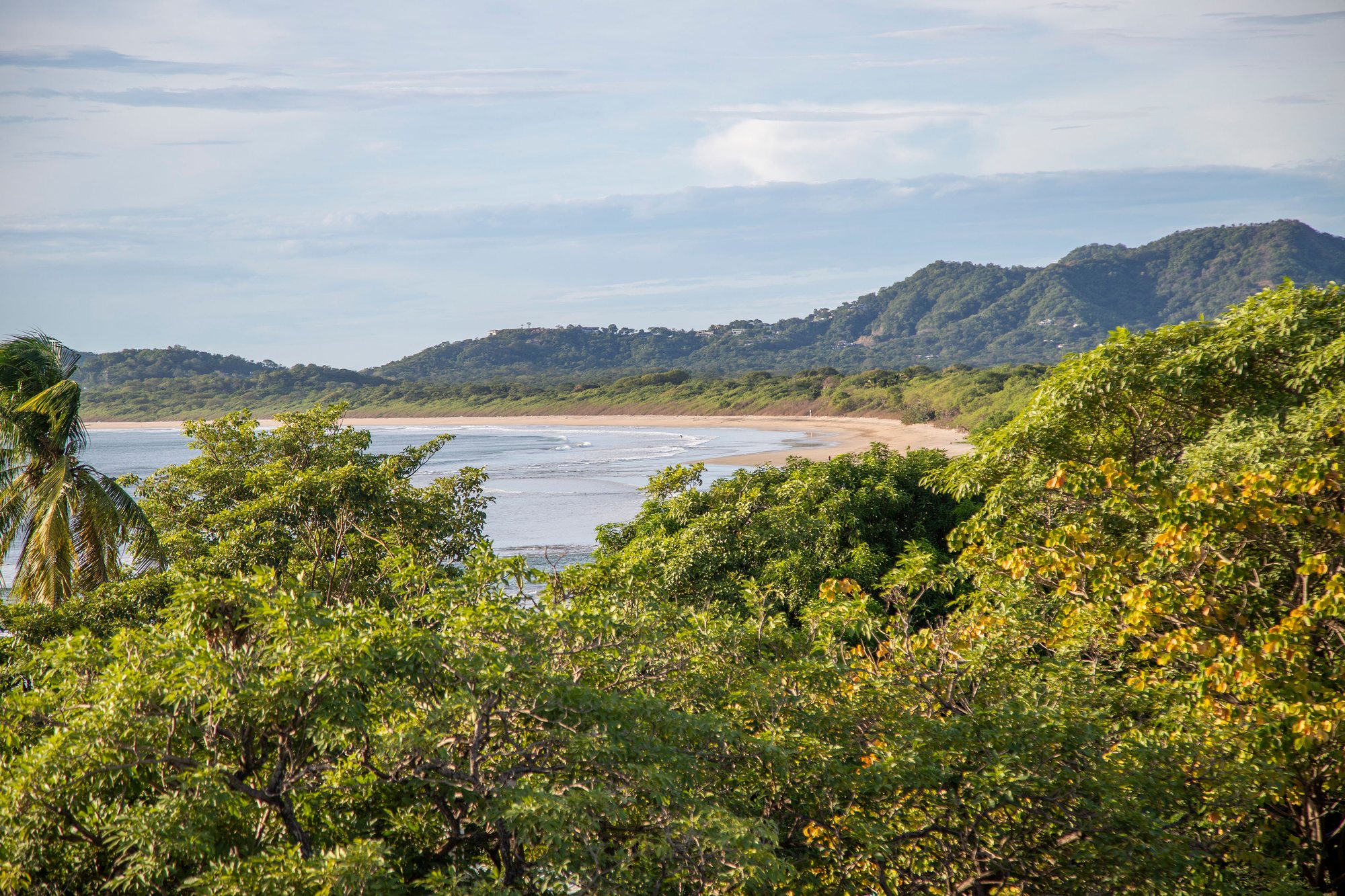 Wide daytime view of the Tamarindo coastline